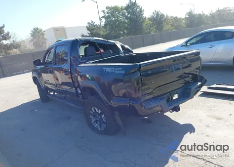 2018 Toyota Tacoma Trd Off Road z USA, uszkodzony, nr VIN 3TMAZ5CN9JM064017